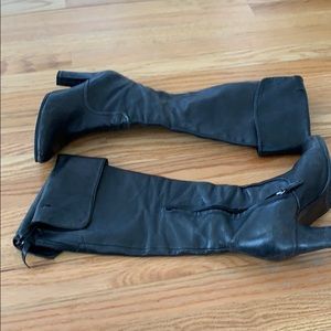 Tall black leather boots